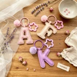 PU leather initial keychain hanging on tote bag zipper pull stainless steel star hook