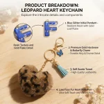 Personalized brown plush heart keychain with blue acrylic initial for backpack