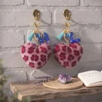 Personalized fuchsia plush heart keychain with blue acrylic letter for backpack