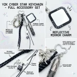 Vintage braided keychain with antique silver charms and star mirror, black and white paracord bag charm.