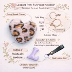 Close-up of the initial heart keychain showing leopard faux fur heart and stitched PU leather letter.