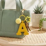 Letter Pom Pom Keychain Yellow Leather Star Charm - Image 4
