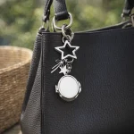 Dreamy gold star and bow charm on a quilted purse, surrounded by pearls and sparkles. Fairycore aesthetic accessory.