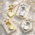 Dreamy gold star and bow charm on a quilted purse, surrounded by pearls and sparkles. Fairycore aesthetic accessory.