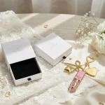 gold-lipstick-keychain-holder-with-star-clasp-and-custom-heart-charm