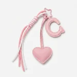 Personalized initial heart keychain in pink PU leather with letter B cutout.